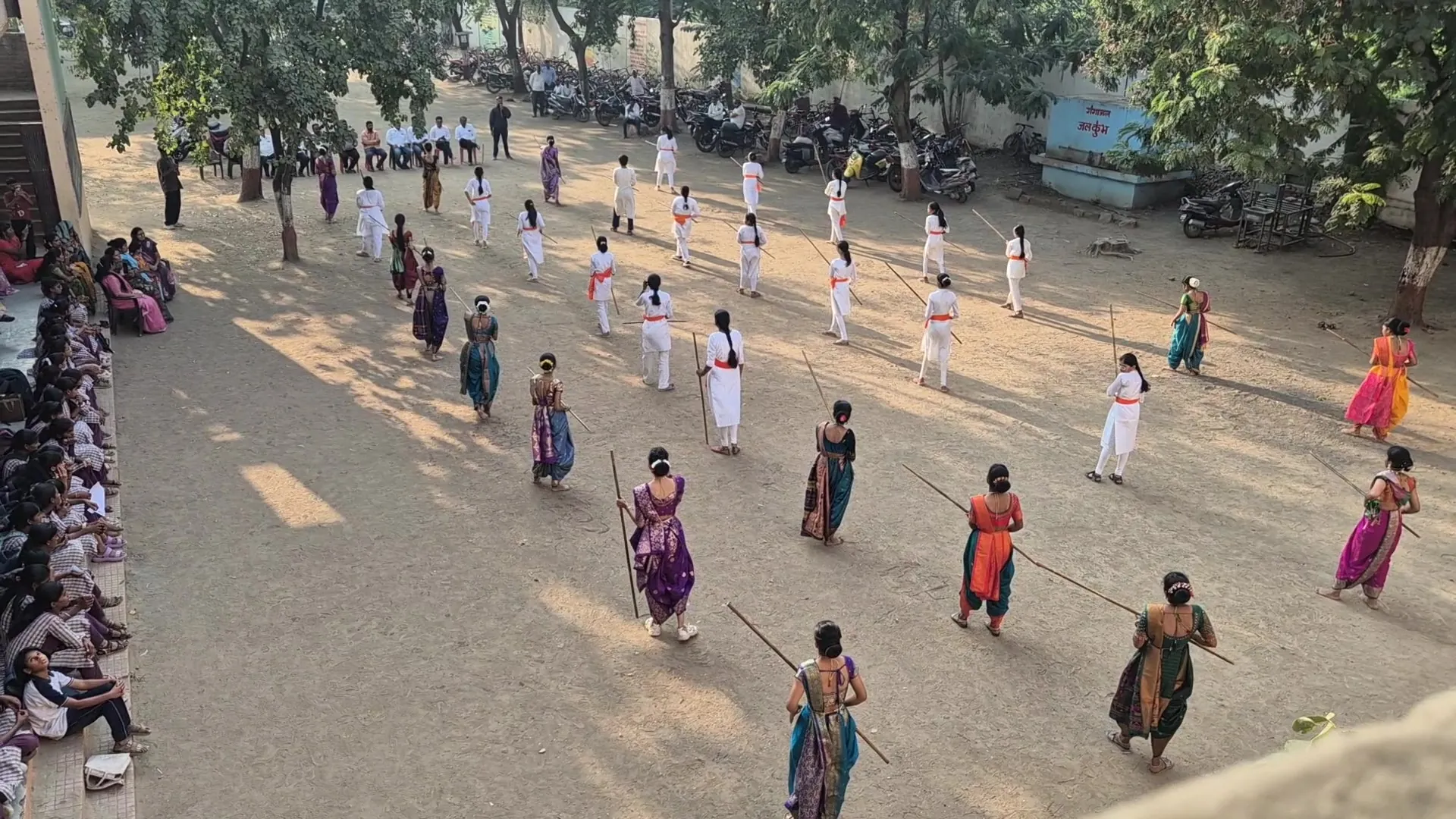 Girls giving a Lathi Kathi demonstration on the final day of the camp at Bharde Highschool, Shevgaon