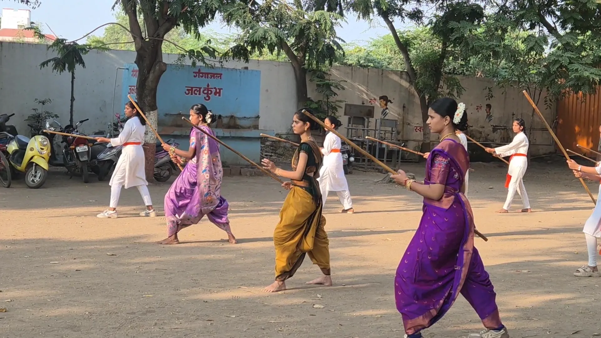 Girls practising Lathi Kathi in pairs at Bharde Highschool, Shevgaon
